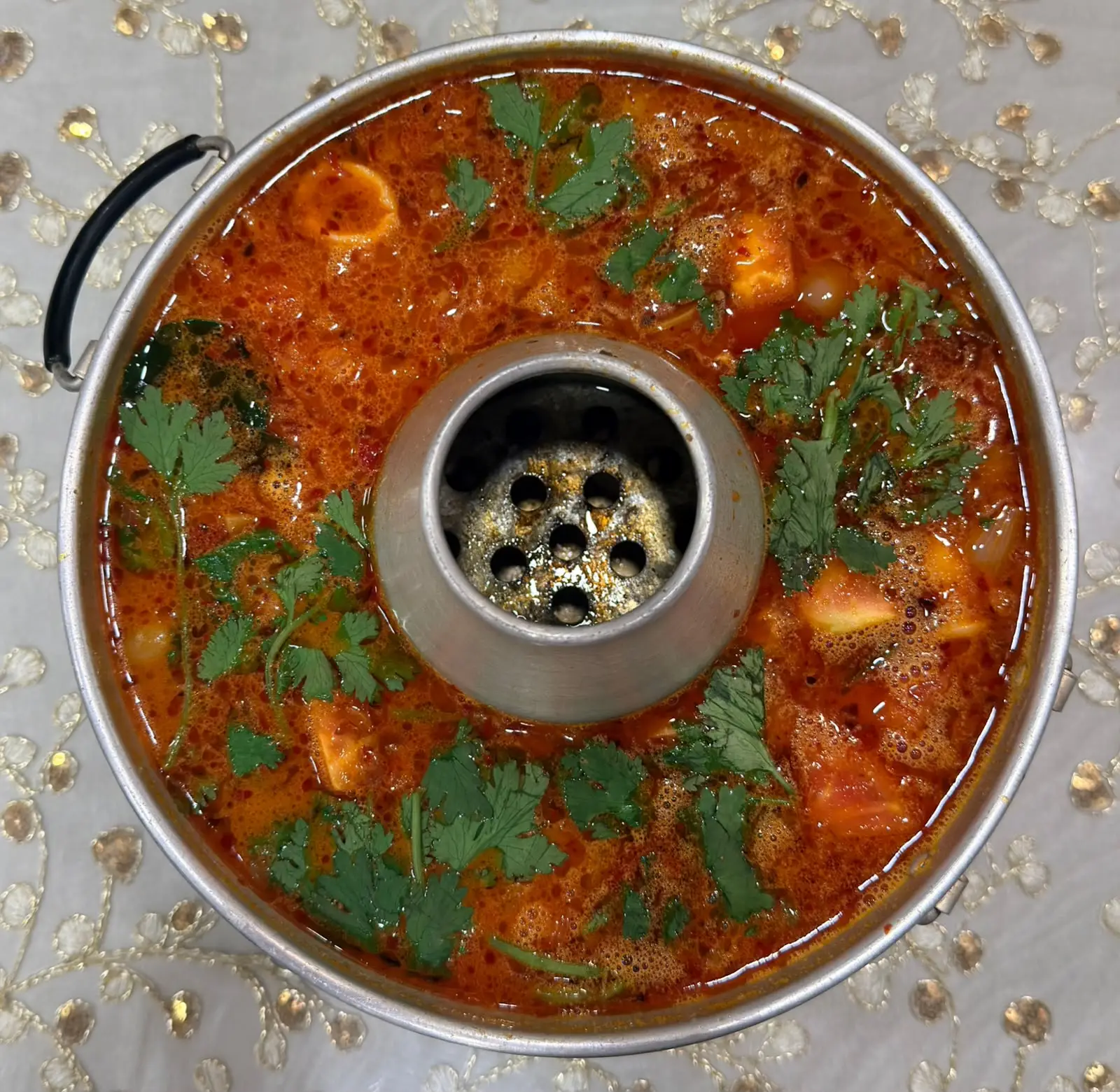 Tom Yum seafood soup served in a hotpot at Royal Kitchen Patong